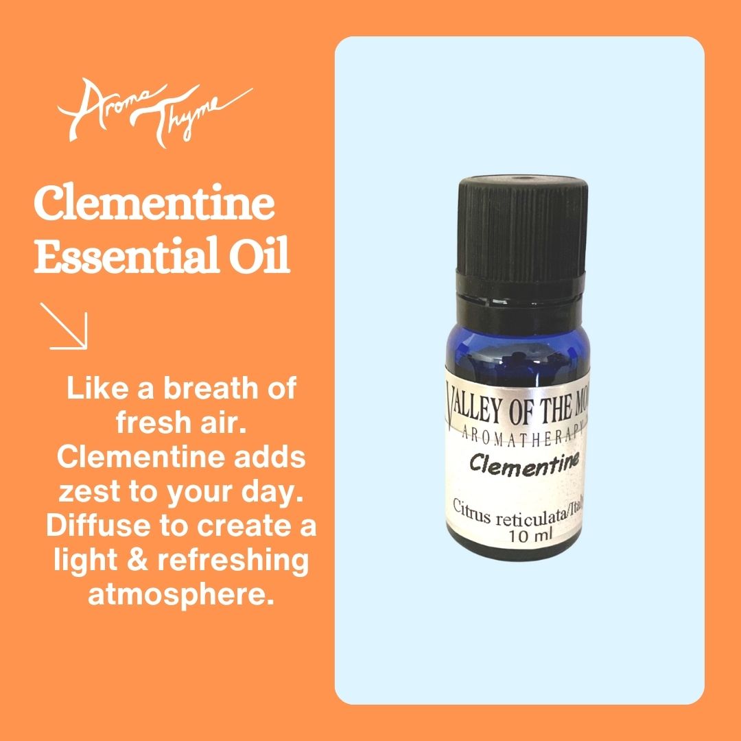 clementine essential oil valley of the moon aromatherapy blue bottle orange background