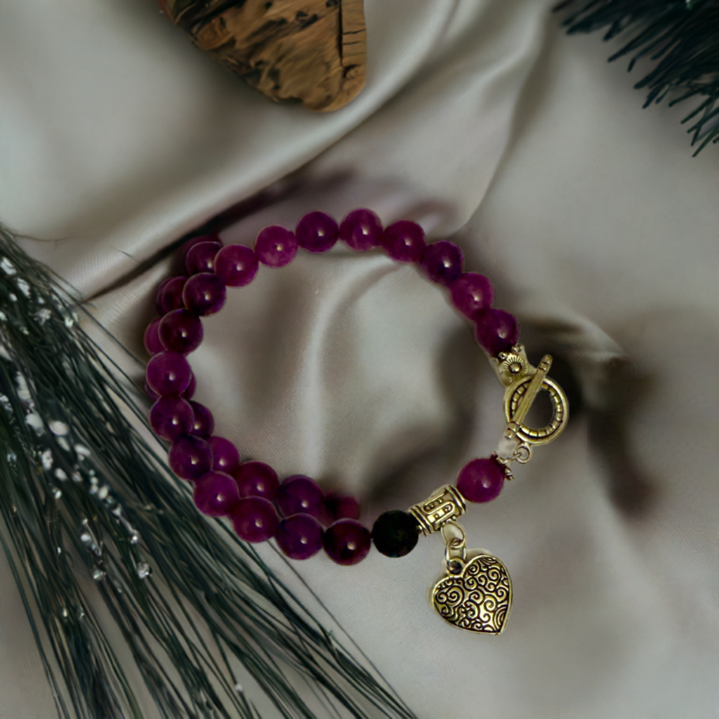 Video showing details of Amethyst essential oil diffuser bracelet with silver heart charm
